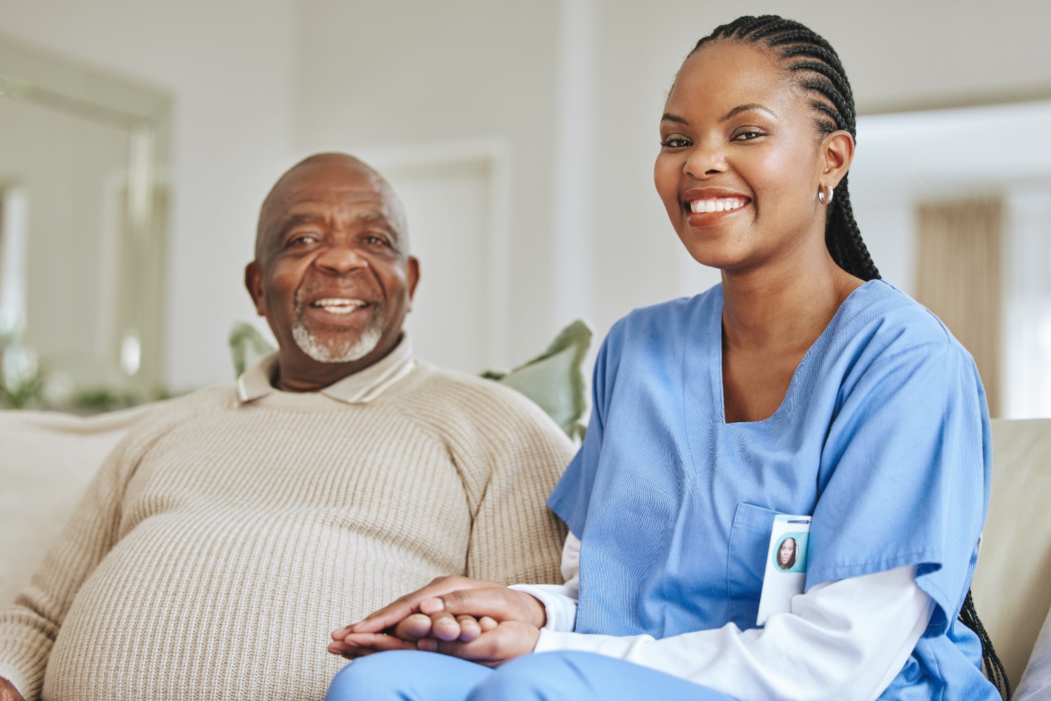 carer with happy elderly man